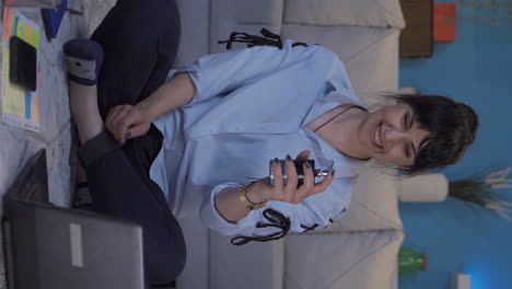 Vertical-video-of-Home-office-worker-sprays-perfume-on-woman.